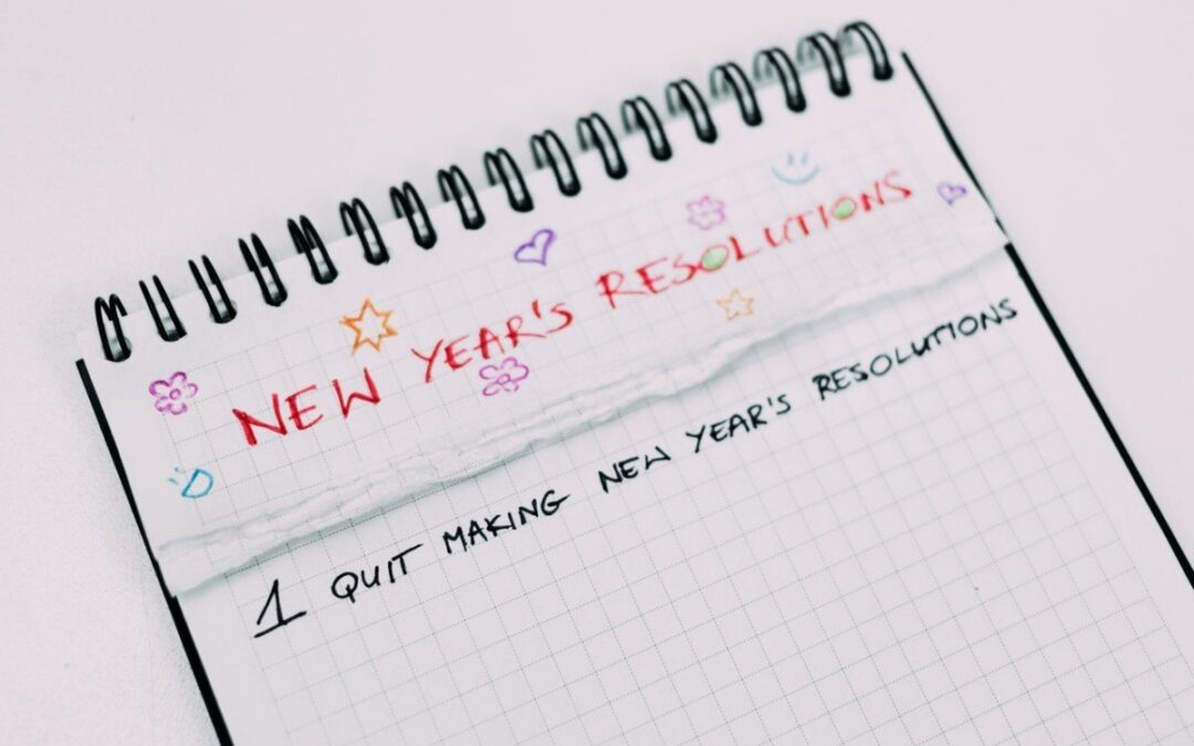 notebook with new year resolution written